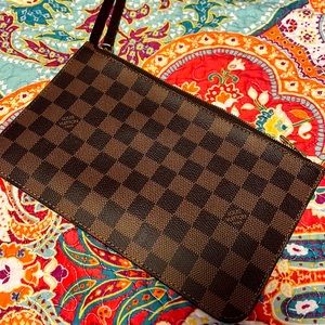 Authentic Louis Vuitton wristlet.
